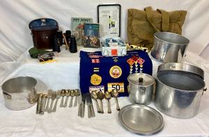 lot 145 image: Vintage Boy Scouts Collection - Haversack Backpack, 1959 Boy Scout Handbook, 1948 Handbook for Boys, Adams Binoculars, First Aid Kit, Multi Functional Compass