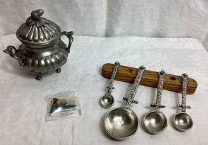 lot 142 image: Tin Woodsman Crosby Taylor Hammered Pewter Measuring Sppons with Wall Display and Vintage Pewter Sugar Bowl with Lid