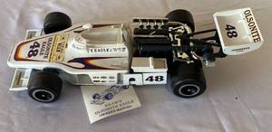 lot 8 image: Vintage Bobby Unser Gurney Olsonite Eagle Racing Car Decanter by Beam with Original Box