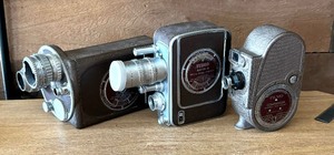lot 21 image: Three Vintage Bell & Howell Cameras