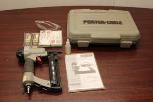lot 72 image: Porter-Cable Pneumatic Brad Nailer Kit with Accessories