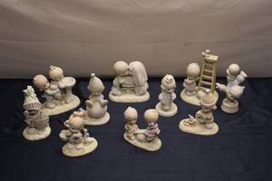 lot 149 image: Collection of 12 Vintage Porcelain Figurines by Samuel J. Butcher