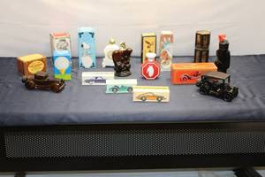 lot 153 image: Assortment of 10 Avon Collector After Shave Bottles & Accessories