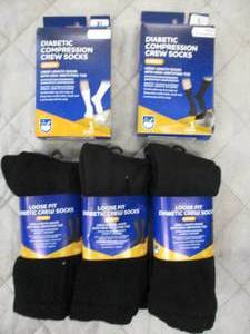 w1- 11 pairs of compression socks...