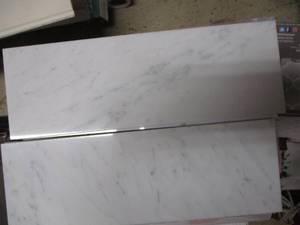 BR- White Carrara 4 x 12 polished...