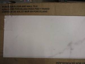 BR- 2 boxes of porcelain floor and ...