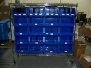 lot 66 image: Storage Bins on a Rolling Rack