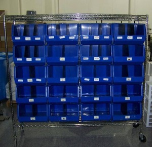 lot 67 image: Storage Bins on a Rolling Rack
