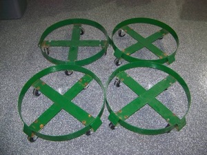 lot 125 image: Lot of 4 - Steel Drum Round Barrel Rolling Dollies  Dolly - Garbage Can Rollers