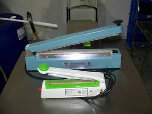 lot 128 image: Lot of 2 Tabletop Sealing Machines