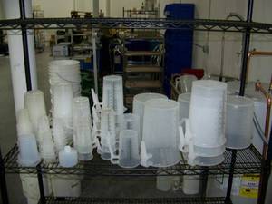 lot 134 image: Large Lot of Various Size Measuring Cups