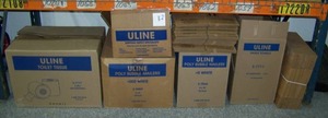 lot 57 image: Miscellaneous Janitorial & Office Lot - Toilet Tissue  Toilet Paper, Poly Bubble Mailers, Paper Towels, Mop Heads and Boxes