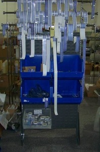 lot 186 image: Large Organizing Rack with Bars for Sticker-type Items and Organizing Bins