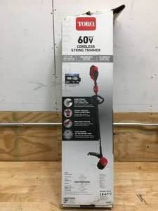 lot 16 image: Toro 60V Cordless String Trimmer With 2 Ah Battery and Charger Model # 51831