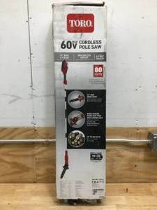 lot 17 image: Toro 60V Cordless Pole Saw With 2 Ah Battery and Charger Model # 51870
