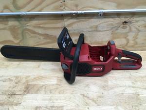 lot 18 image: Toro 60V Cordless Chainsaw With 2.5Ah Battery and Charger Model # 51850