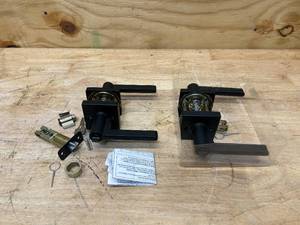 lot 176 image: DEFIANT Lot of 2- Tonebridge Matte Black Keyed Entry Door Levers with Square Rose