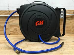 lot 48 image: Campbell Hausfeld Retractable Hose Reel Model # AA602100