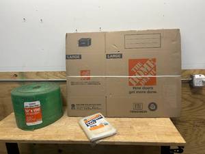 lot 153 image: Lot of 10- Large Moving Boxes, a 150 Roll of Bubble Wrap and Pack of QueenKing Mattress Bags