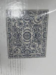 lot 47 image: Ruggable Washable 8 x 10 Rug Cover & Nonslip Pad-Blue White