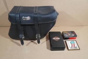 lot 313 image: Motorcycle Saddle Bag with Collectables