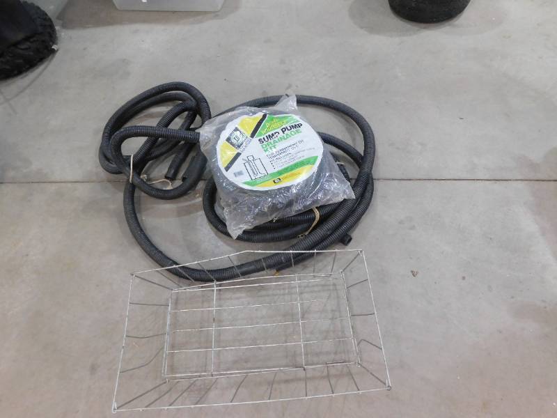 lot 89 image: Sump Pump Hose Lot with Wire Basket
