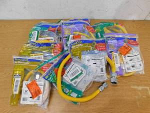 lot 85 image: Assorted gas line Appliance Hookup Lot.