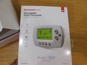 lot 67 image: Honeywell Home Wi-Fi 7-Day Programmable Smart Thermostat with Digital Backlit Display