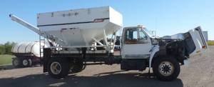 1990 Ford F700 truck with 10 ton hopper tank