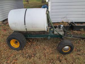 Home-made 55-gallon pull behind che...