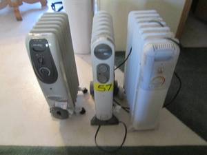 (3) rolling space heaters...