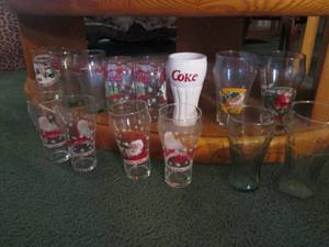Variety of collectible Coca-Cola gl...