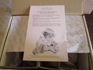 Porcelain Melanie doll in original ...