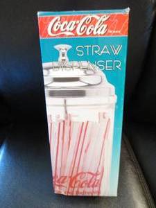Coca-Cola straw dispenser in origin...