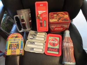 Variety of Coca-Cola lidded collect...
