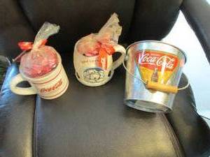 Coca-Cola tin and collector candy m...