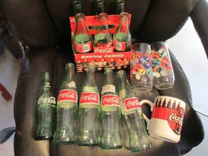 Assortment of glass Coca-Cola bottl...