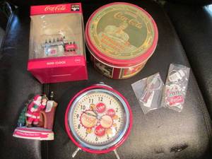 Lidded Coca-Cola collector tins and...