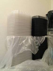 Stack of Disposable take-out trays ...