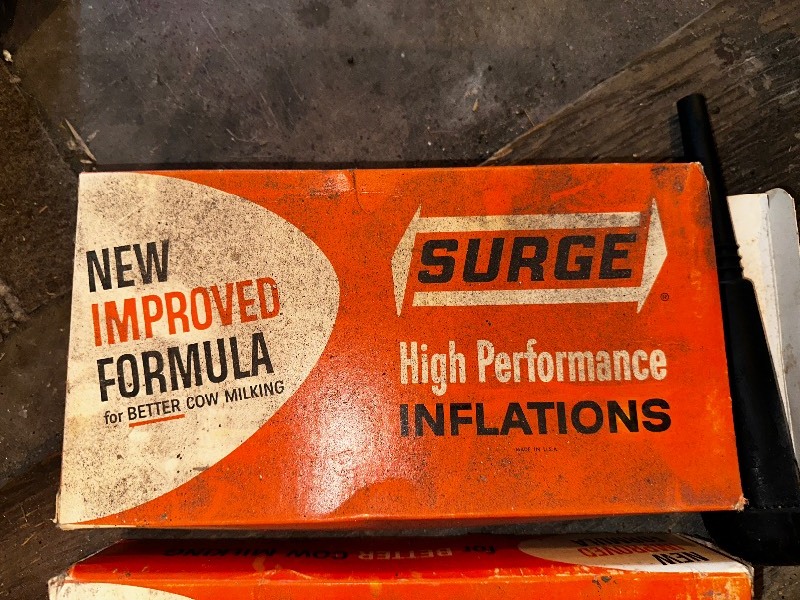 lot 1043 image: Two Boxes of Vintage Surger High Performance Inflations Dairy Milkers