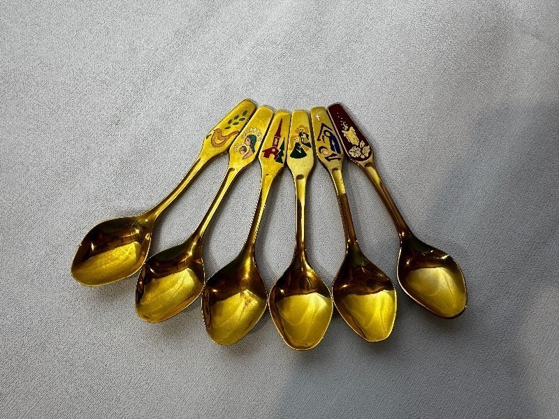 lot 547 image: Vintage MEKA Denmark Gold Plated Holiday Spoon Set of Six. Years 1970,1971, 1972, 1977,1978, & 1983