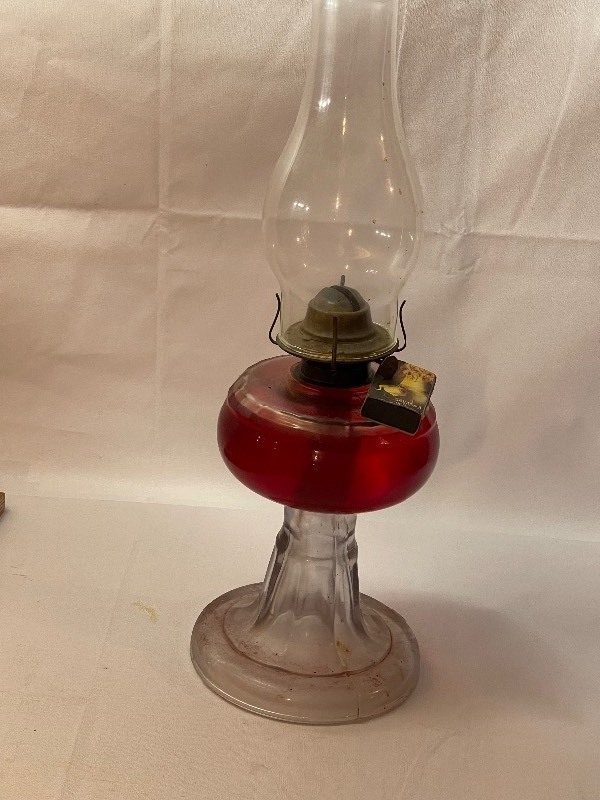 lot 703 image: Antique Oil Lamp, 17 Inches High 7 Inch Diameter At Base