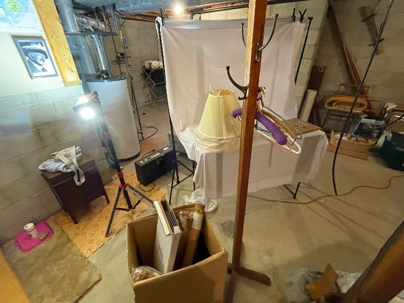 lot 799 image: Coat Rack, Hangers, Lampshades, And 4 Island Mats