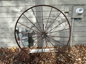 lot 1056 image: Antique Iron Metal Farm Wagon Wheel