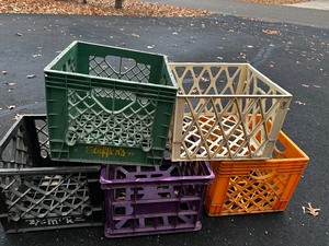 lot 973 image: Vintage Rigid Plastic Milk Crates - Clover Leaf Milk, Steffens, and Golden Guernsey Dairy
