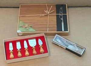 lot 26 image: Swissmar Bamboo Cutting Board Set, Michael Aram Topo Cheese Knife and Williams-Sonoma Cheese Knives