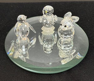 lot 58 image: Three Crystal Duck, Bunny and Penguin Figurines with Mirrored Under Plate