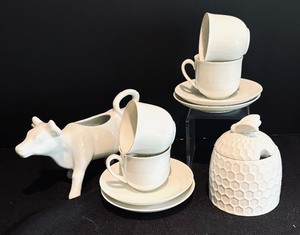 lot 77 image: Cow Motif Creamer Pitcher, Honey Pot and 4 Demitasse Cups with Saucers