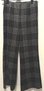 lot 65 image: ESCADA Beautiful Black and White Wide Leg Pants with Leather Detailing at Waist