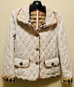 lot 12 image: Burberry Classic Quilted Jacket